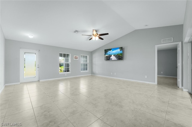 unfurnished living room with light tile patterned floors, ceiling fan, and vaulted ceiling