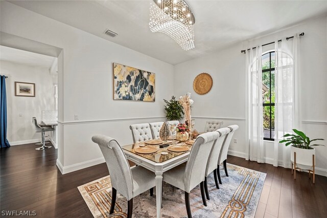 dining area featuring dark hardwood / wood-style flooring