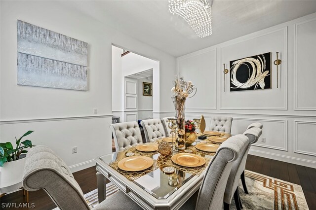 dining area featuring wood-type flooring