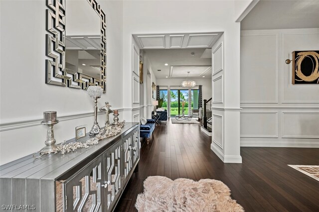 corridor with dark hardwood / wood-style floors