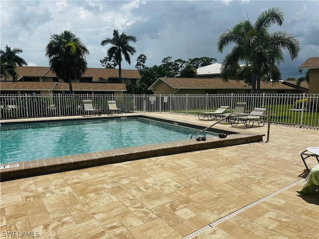 view of pool featuring a patio area