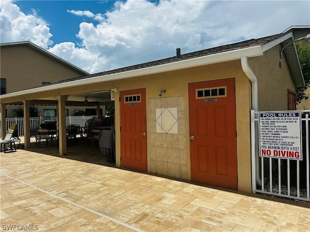 property entrance with a patio