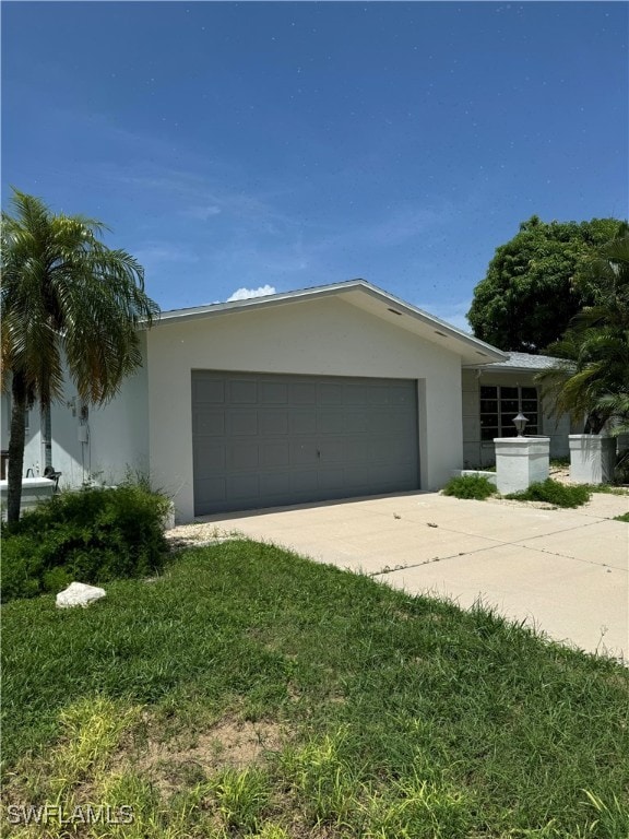 view of side of home with a garage