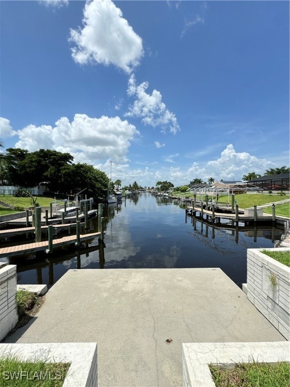 dock area with a water view