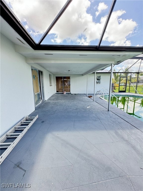 exterior space with a patio and a lanai