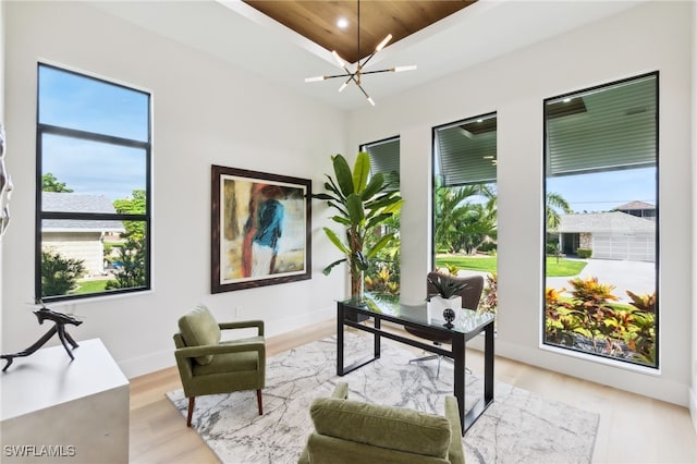 office area with light hardwood / wood-style floors