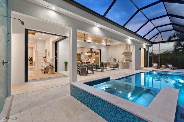 pool at dusk with a patio, a grill, area for grilling, an in ground hot tub, and glass enclosure