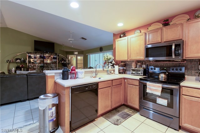 kitchen featuring black dishwasher, electric range oven, kitchen peninsula, and backsplash