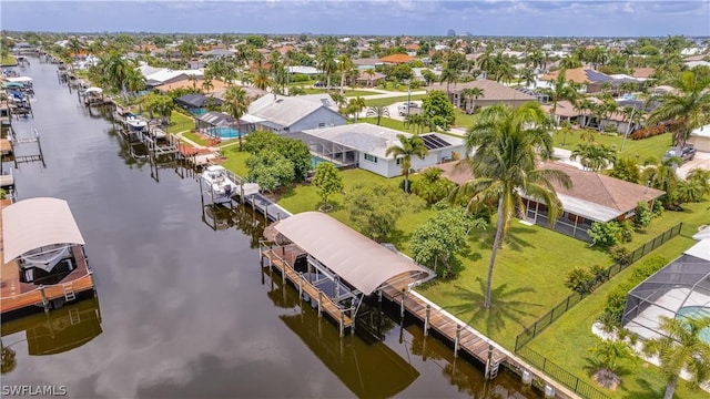 drone / aerial view with a water view