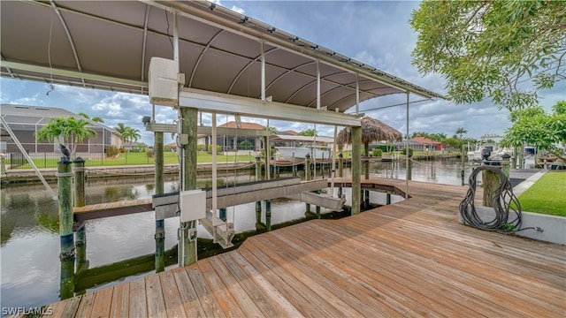 view of dock with a water view