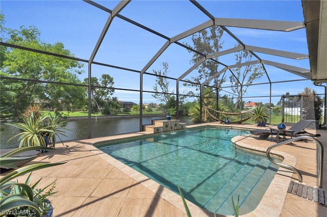 view of pool with a lanai, a patio, a water view, and pool water feature