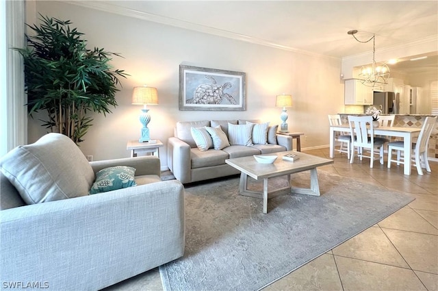 living room featuring ornamental molding, an inviting chandelier, and light tile patterned floors