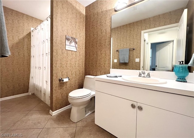 bathroom featuring vanity, tile patterned flooring, toilet, and wallpapered walls