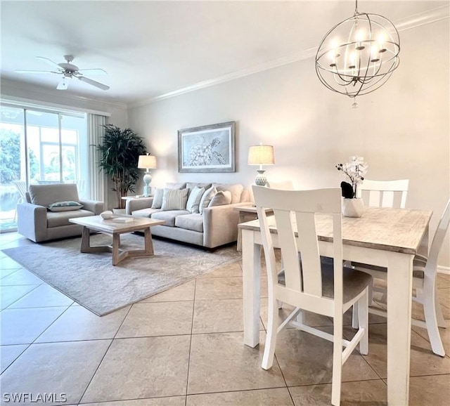 living area featuring ceiling fan with notable chandelier, light tile patterned flooring, and crown molding