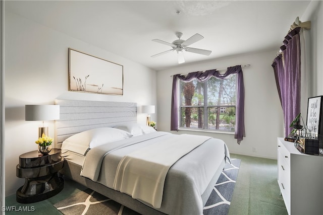 carpeted bedroom featuring ceiling fan