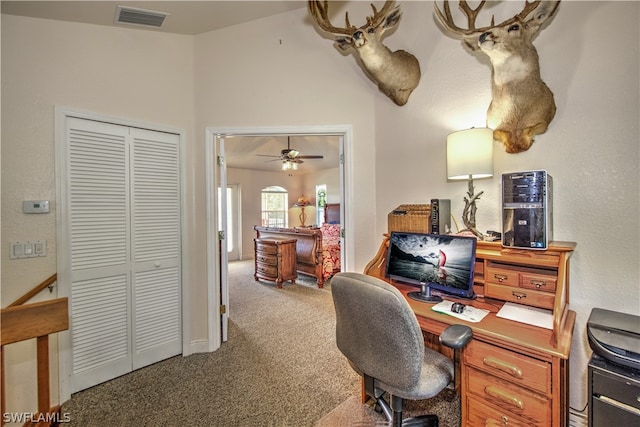 office area with ceiling fan and carpet flooring