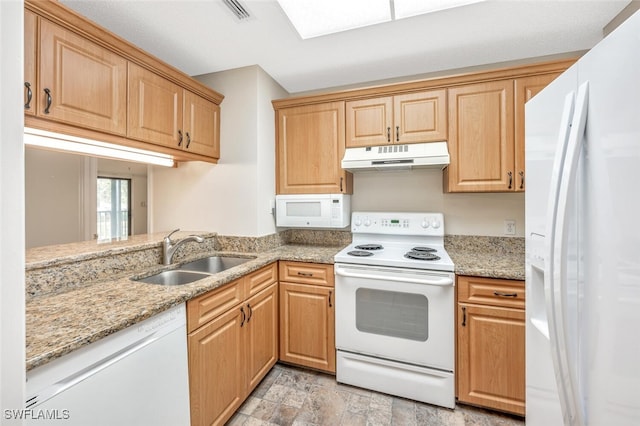 900 Arbor Lake Dr Unit 206, Naples, FL 34110 - kitchen with light stone counters, sink, and white appliances