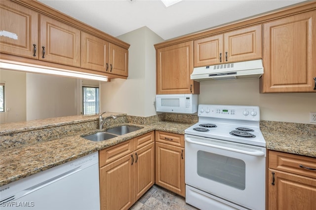 900 Arbor Lake Dr Unit 206, Naples, FL 34110 - kitchen with light stone counters, white appliances, kitchen peninsula, and sink
