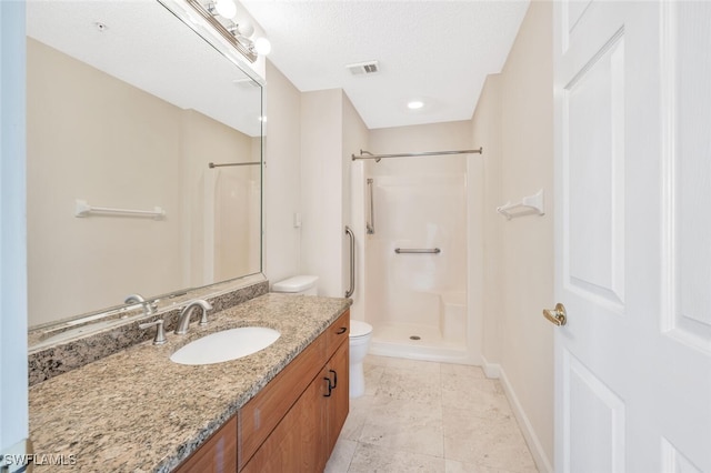 900 Arbor Lake Dr Unit 206, Naples, FL 34110 - bathroom with toilet, vanity, a textured ceiling, and walk in shower
