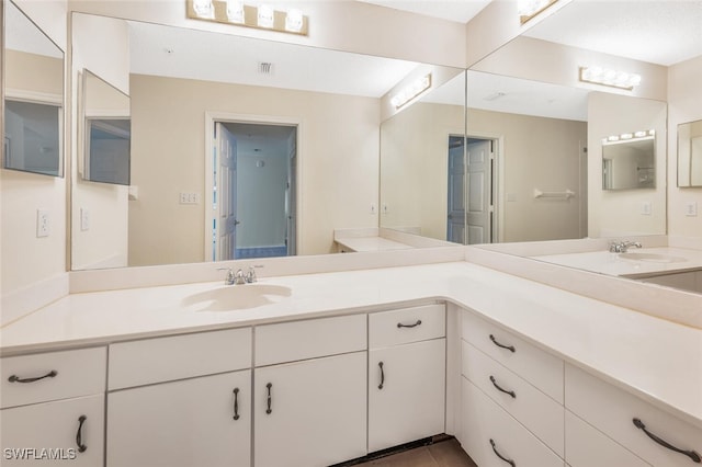 900 Arbor Lake Dr Unit 206, Naples, FL 34110 - bathroom with vanity and tile patterned floors
