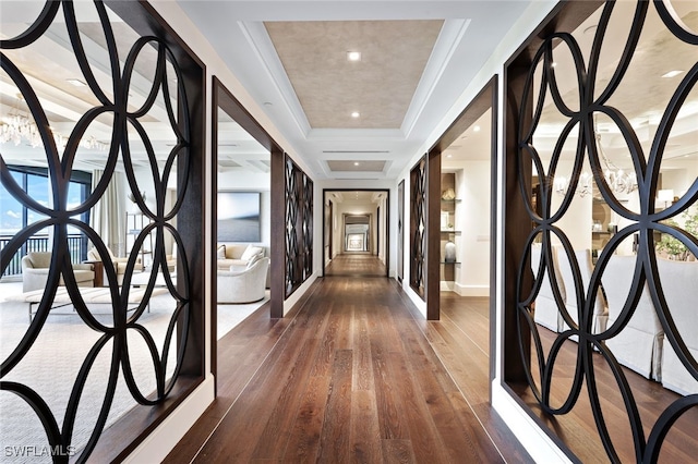 4800 Pelican Colony Blvd Unit Ph2103, Bonita Springs, FL 34134 - hall featuring a raised ceiling, dark wood-style flooring, baseboards, and recessed lighting