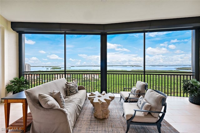 sunroom with a water view