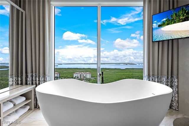 4800 Pelican Colony Blvd Unit Ph2103, Bonita Springs, FL 34134 - bathroom featuring a water view, marble finish flooring, and a soaking tub
