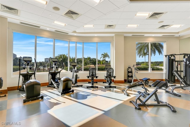 gym featuring a drop ceiling