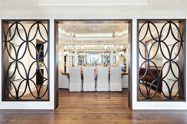 foyer featuring a notable chandelier and wood-type flooring