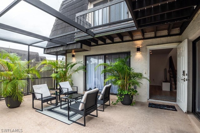 view of patio / terrace featuring a lanai