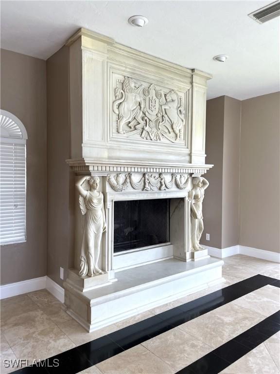 details featuring a high end fireplace