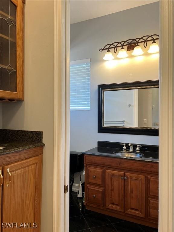 bathroom with vanity and tile patterned floors