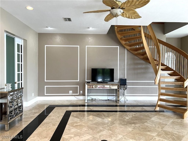 living room with ceiling fan