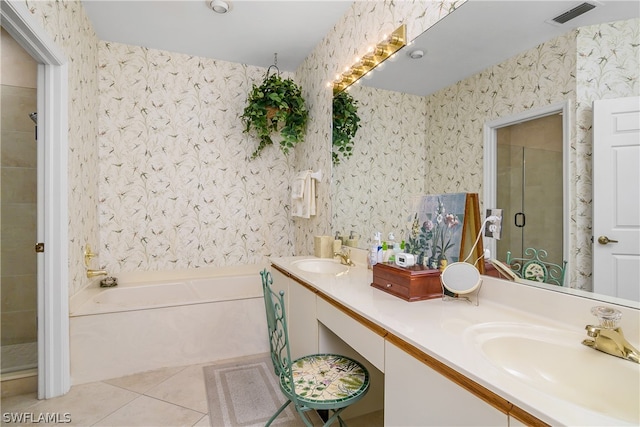 bathroom featuring tile patterned flooring, vanity, and plus walk in shower