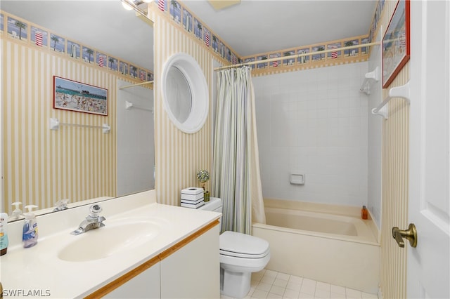 full bathroom with tile patterned flooring, vanity, toilet, and shower / bath combo with shower curtain