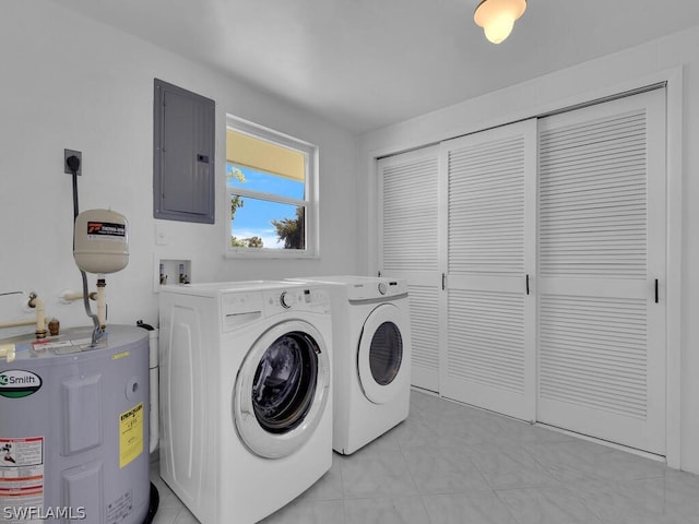 clothes washing area featuring laundry area, electric panel, separate washer and dryer, light tile patterned flooring, and electric water heater
