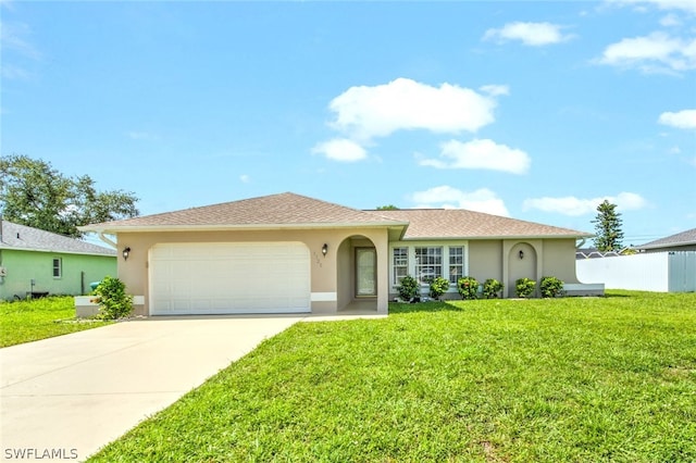 ranch-style house with a front yard and a garage