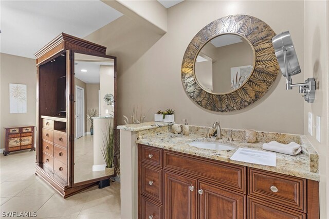 bathroom featuring vanity and tile patterned flooring