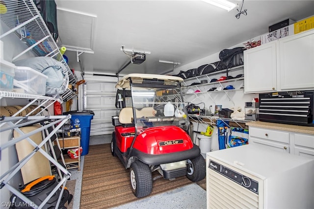 garage featuring a garage door opener