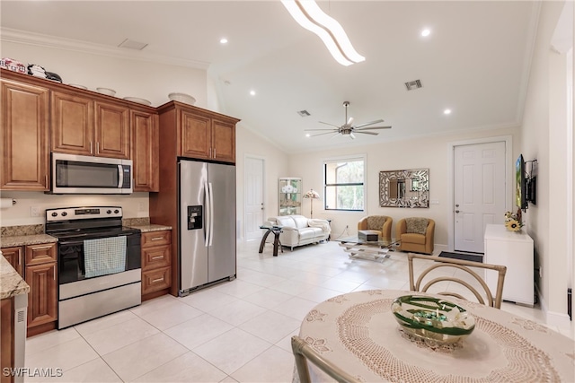 kitchen with light tile patterned floors, ornamental molding, light stone countertops, ceiling fan, and stainless steel appliances