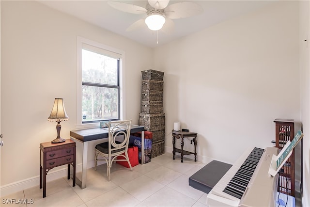 office featuring ceiling fan and light tile patterned floors