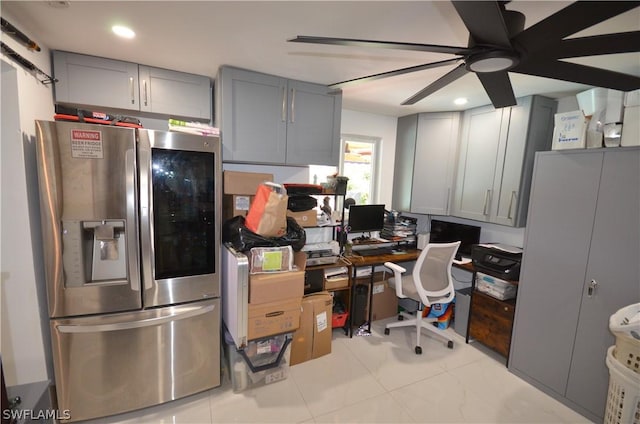 home office with light tile patterned flooring and ceiling fan