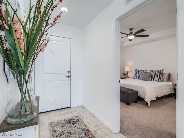 interior space featuring ceiling fan