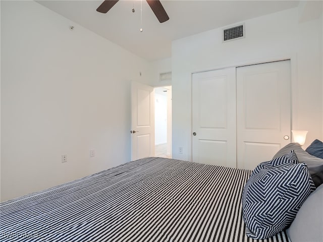 bedroom featuring a closet and ceiling fan