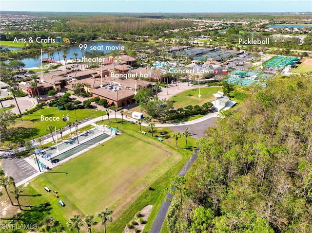 birds eye view of property with a water view