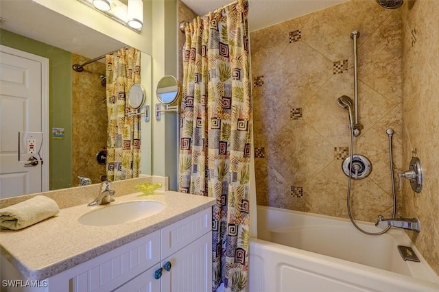 bathroom with shower / tub combo with curtain and vanity