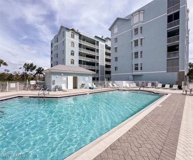 view of swimming pool featuring a patio