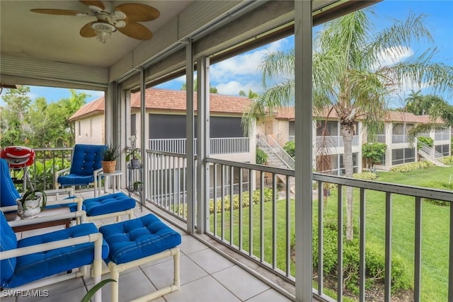 sunroom / solarium with ceiling fan