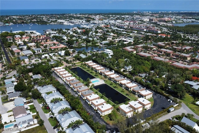 bird's eye view with a water view