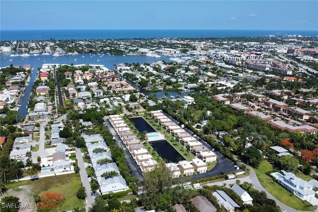 drone / aerial view with a water view